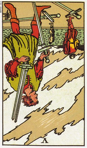 перевернута П'ятірка мечів таро